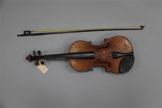 A violin with two piece back, bearing label for Petrus IO.. Mantegalia Mediolani, overall 23.5in., cased with bow